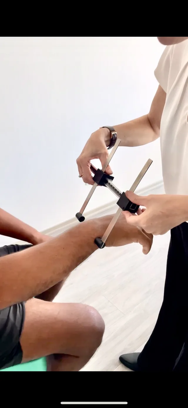Measuring a bone breadth with a caliper
